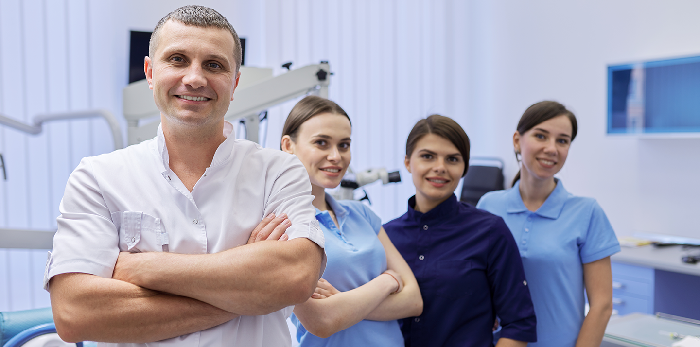 Doctors and team members smiling